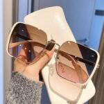 Women's light-colored sunglasses
