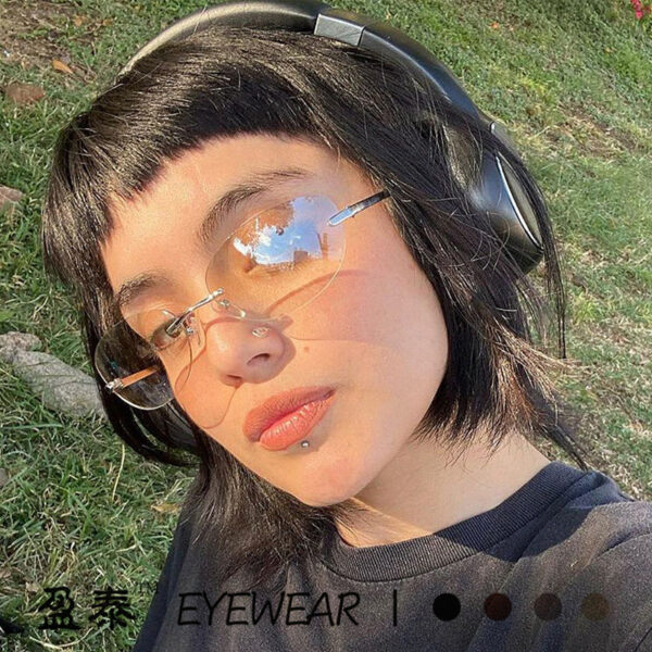 Retro frameless oval sunglasses